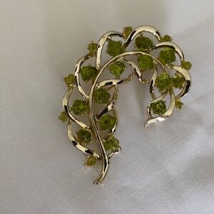 Vintage 1960's Gold Tone Curled Leaf with Green Peridot Stones